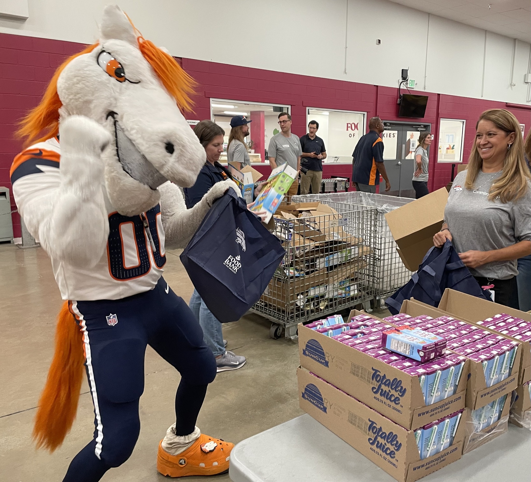 The Denver Broncos partnered with CommonSpirit St. Anthony North Hospital and Food Bank of the Rockies for a food drive event