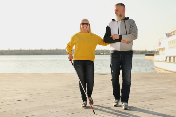 Couple walking on the boardwalk.