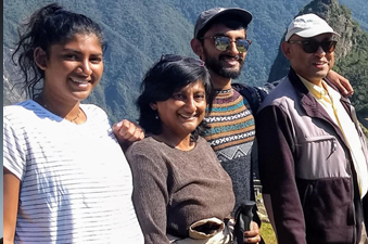 Photo of Vani Nilakantan and three adults.